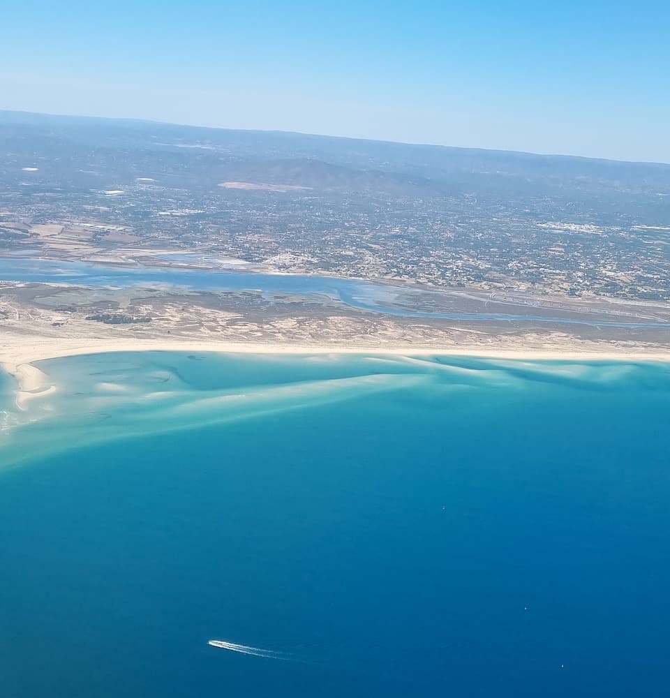 The color of the water in the Algarve is spectacular when viewed from land or sky.