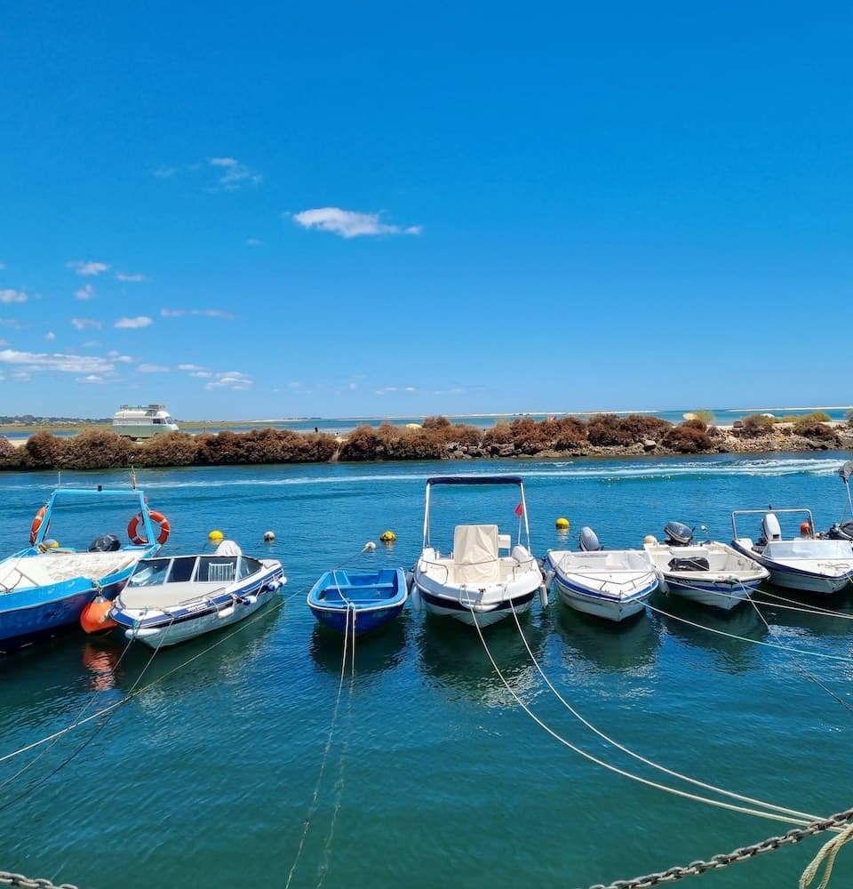 Walk along the shore and watch the boats return in the evenings.