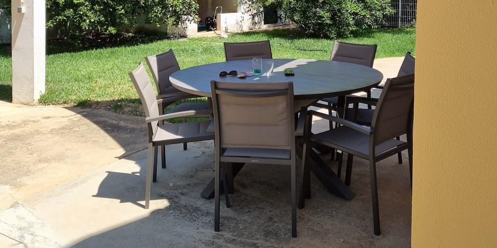 The outdoor dining area provides shaded dining space.